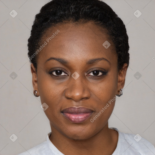 Joyful black young-adult female with short  black hair and brown eyes