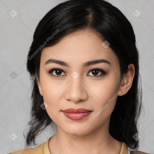 Joyful latino young-adult female with medium  black hair and brown eyes