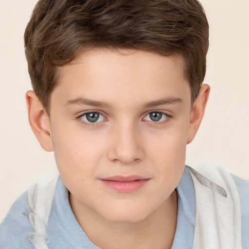 Joyful white child male with short  brown hair and brown eyes