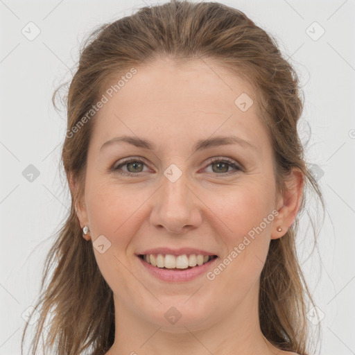 Joyful white young-adult female with long  brown hair and grey eyes