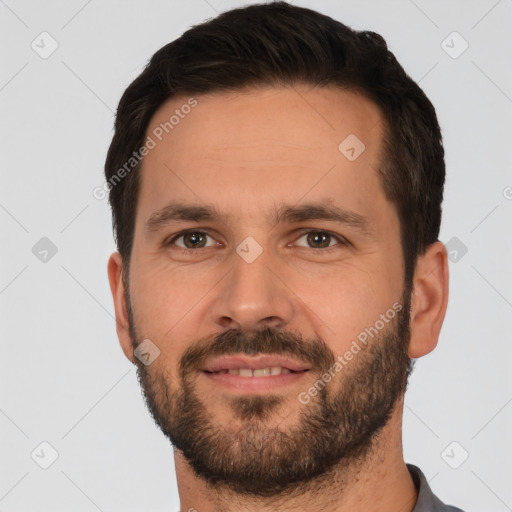 Joyful white young-adult male with short  brown hair and brown eyes