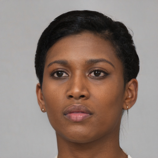 Neutral black young-adult female with short  black hair and brown eyes