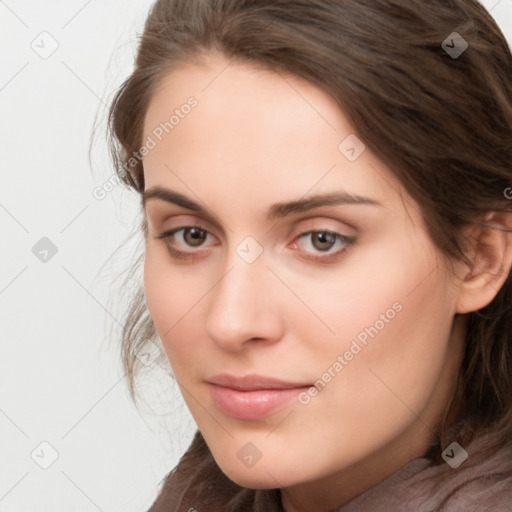 Neutral white young-adult female with medium  brown hair and brown eyes