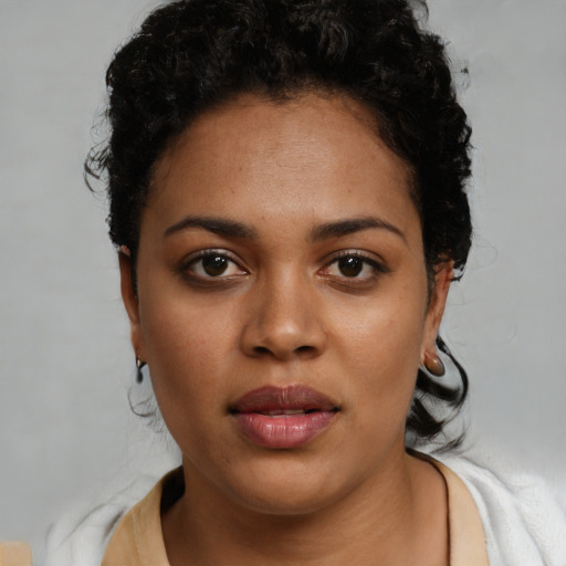 Neutral black young-adult female with short  black hair and brown eyes