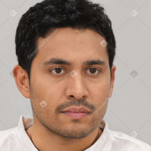 Neutral latino young-adult male with short  black hair and brown eyes