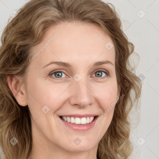 Joyful white young-adult female with long  brown hair and green eyes