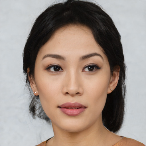 Neutral asian young-adult female with medium  black hair and brown eyes