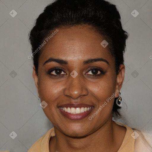 Joyful black young-adult female with short  black hair and brown eyes