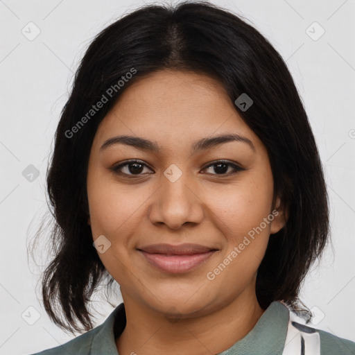 Joyful latino young-adult female with medium  brown hair and brown eyes