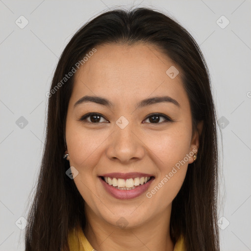 Joyful white young-adult female with long  brown hair and brown eyes