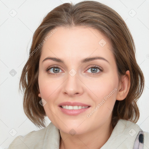 Joyful white young-adult female with medium  brown hair and blue eyes