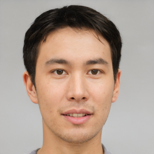 Neutral asian young-adult male with short  brown hair and brown eyes