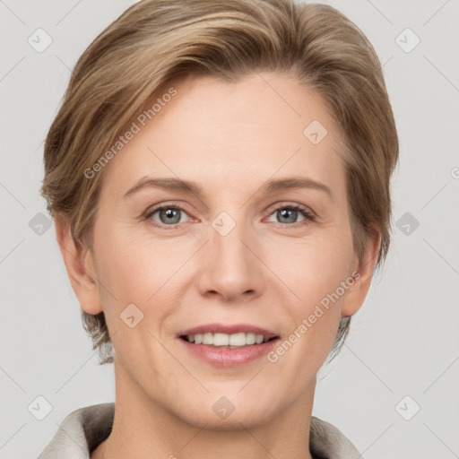 Joyful white adult female with short  brown hair and grey eyes