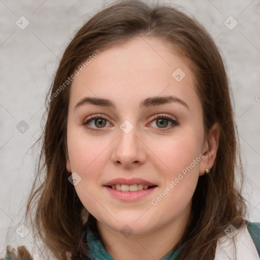 Joyful white young-adult female with medium  brown hair and blue eyes