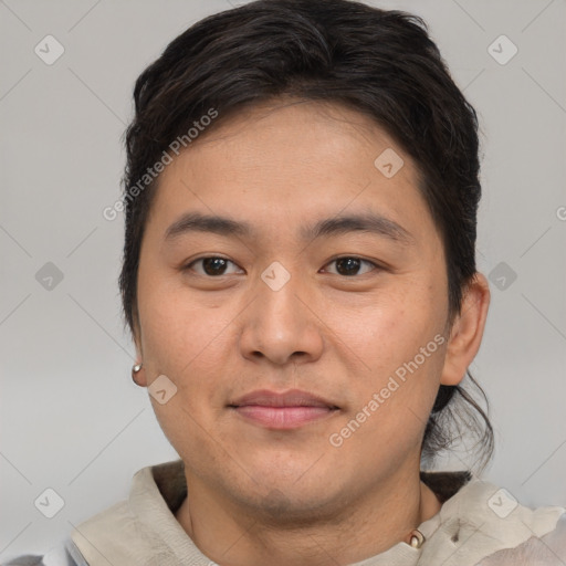 Joyful asian young-adult male with short  brown hair and brown eyes