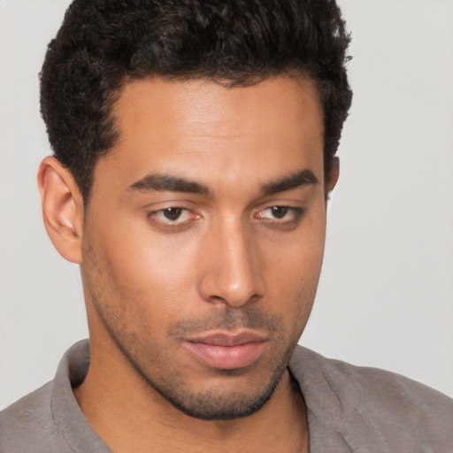 Neutral white young-adult male with short  black hair and brown eyes