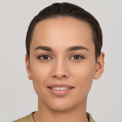 Joyful white young-adult female with short  brown hair and brown eyes