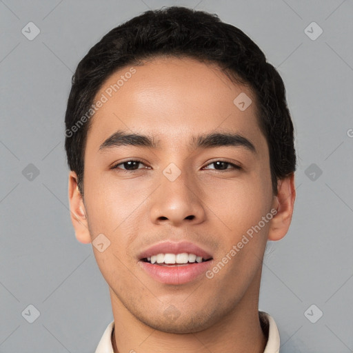 Joyful white young-adult male with short  black hair and brown eyes