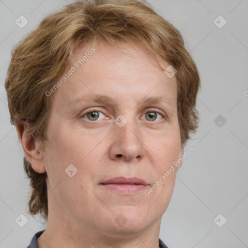 Joyful white adult female with short  brown hair and grey eyes