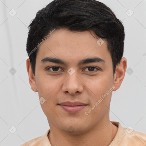 Joyful white young-adult male with short  black hair and brown eyes