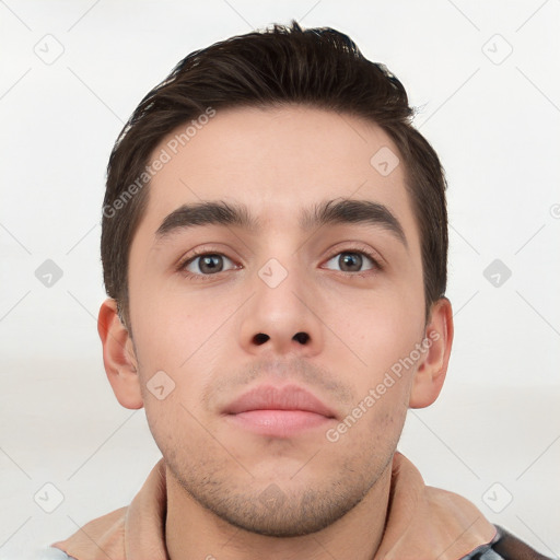 Neutral white young-adult male with short  brown hair and brown eyes