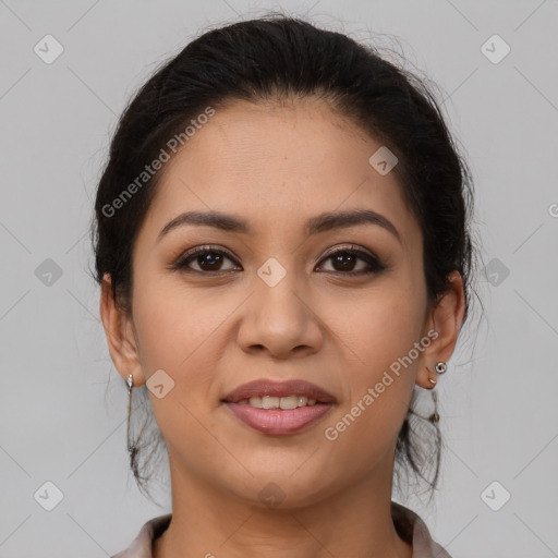 Joyful latino young-adult female with long  brown hair and brown eyes