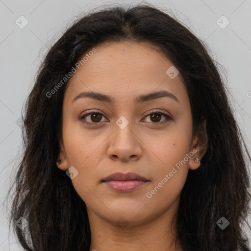 Joyful latino young-adult female with long  brown hair and brown eyes