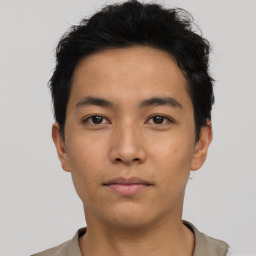 Neutral asian young-adult male with short  brown hair and brown eyes