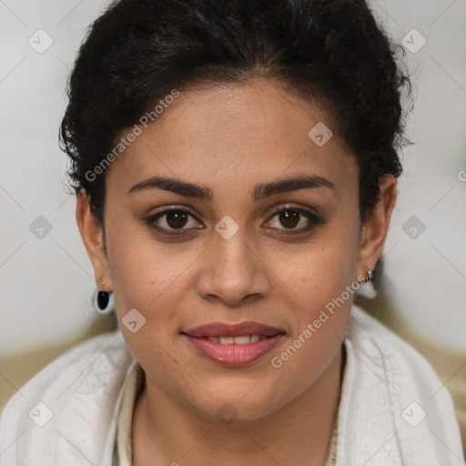 Joyful latino young-adult female with short  brown hair and brown eyes