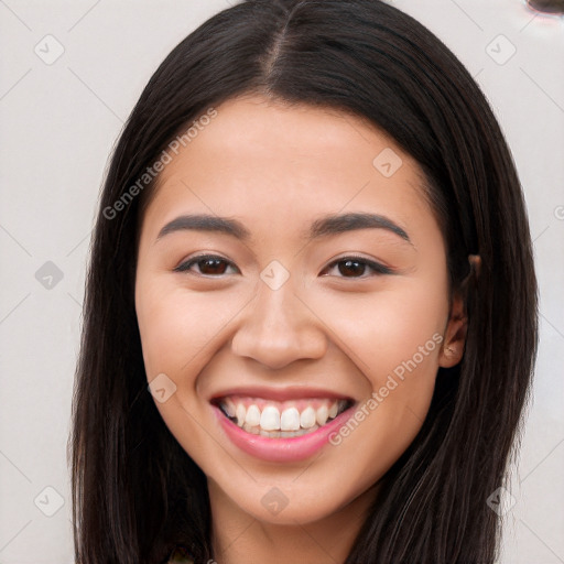 Joyful white young-adult female with long  brown hair and brown eyes