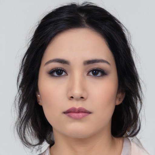 Neutral asian young-adult female with medium  black hair and brown eyes