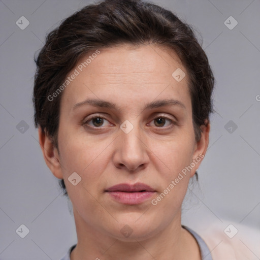 Joyful white adult female with short  brown hair and brown eyes