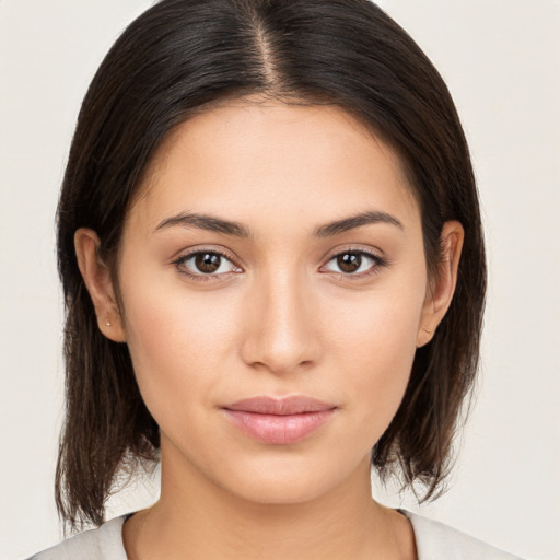 Neutral white young-adult female with medium  brown hair and brown eyes