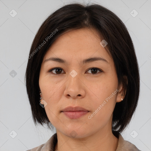 Neutral asian young-adult female with medium  brown hair and brown eyes