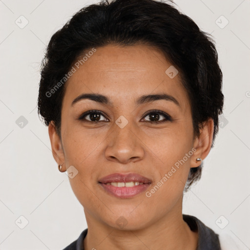 Joyful latino young-adult female with short  brown hair and brown eyes