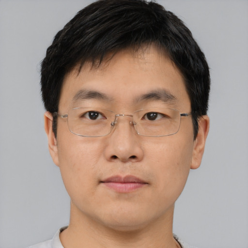 Neutral asian young-adult male with short  brown hair and brown eyes