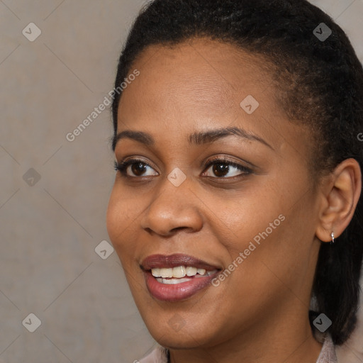 Joyful black young-adult female with medium  brown hair and brown eyes