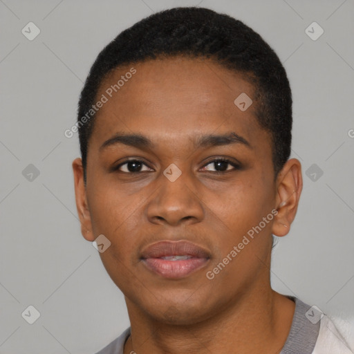 Joyful black young-adult male with short  black hair and brown eyes