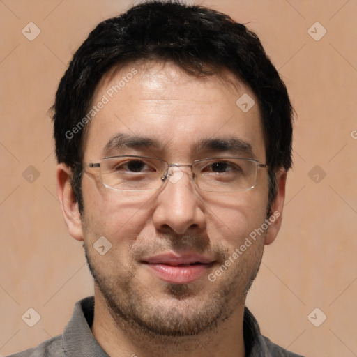 Joyful white adult male with short  black hair and brown eyes