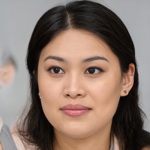 Joyful white young-adult female with medium  brown hair and brown eyes