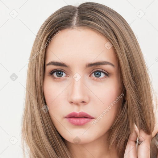 Neutral white young-adult female with long  brown hair and brown eyes