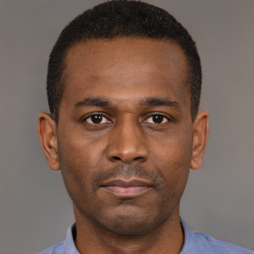 Neutral black young-adult male with short  brown hair and brown eyes
