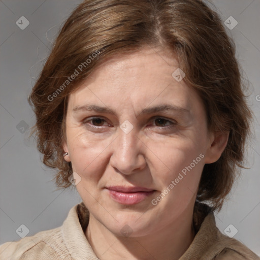 Joyful white adult female with medium  brown hair and brown eyes