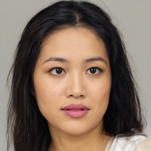 Neutral asian young-adult female with long  brown hair and brown eyes