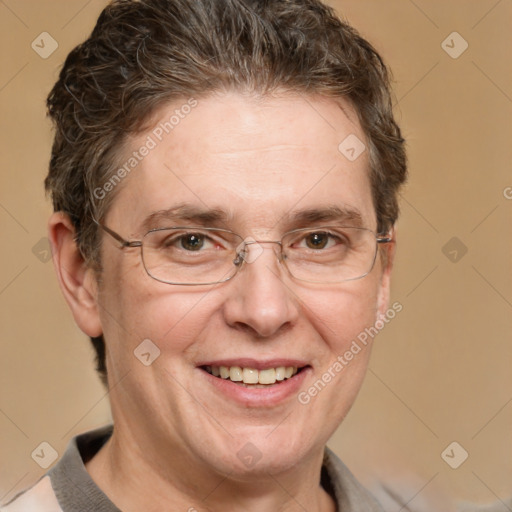 Joyful white adult male with short  brown hair and grey eyes