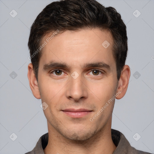 Joyful white young-adult male with short  brown hair and brown eyes