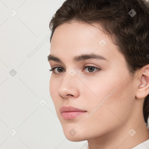 Neutral white young-adult female with short  brown hair and brown eyes