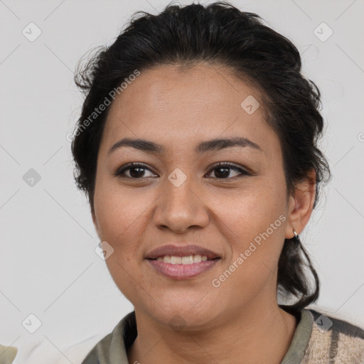 Joyful latino young-adult female with short  brown hair and brown eyes