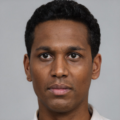 Neutral black young-adult male with short  black hair and brown eyes