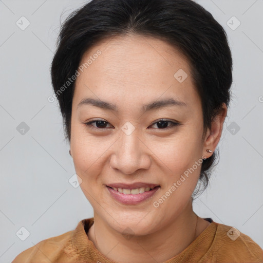 Joyful asian young-adult female with medium  brown hair and brown eyes